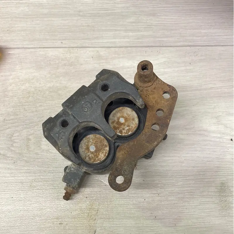2006 Kawasaki KLF300C Front Brake Caliper
